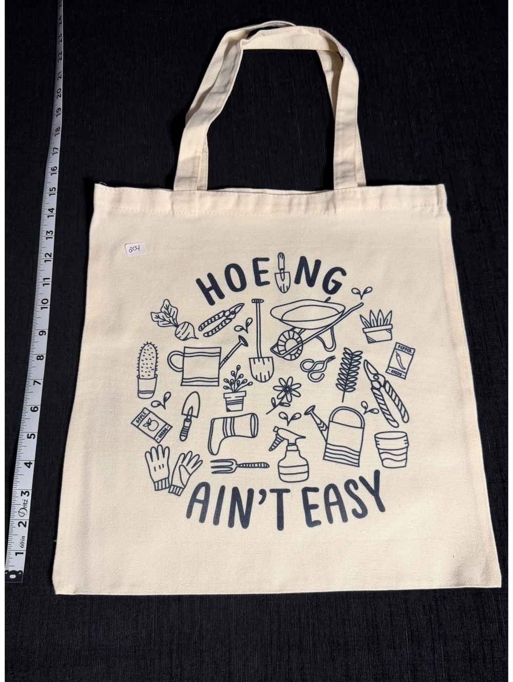 Hoeing Ain't Easy Canvas Tote Bag with Gardening Tools Design